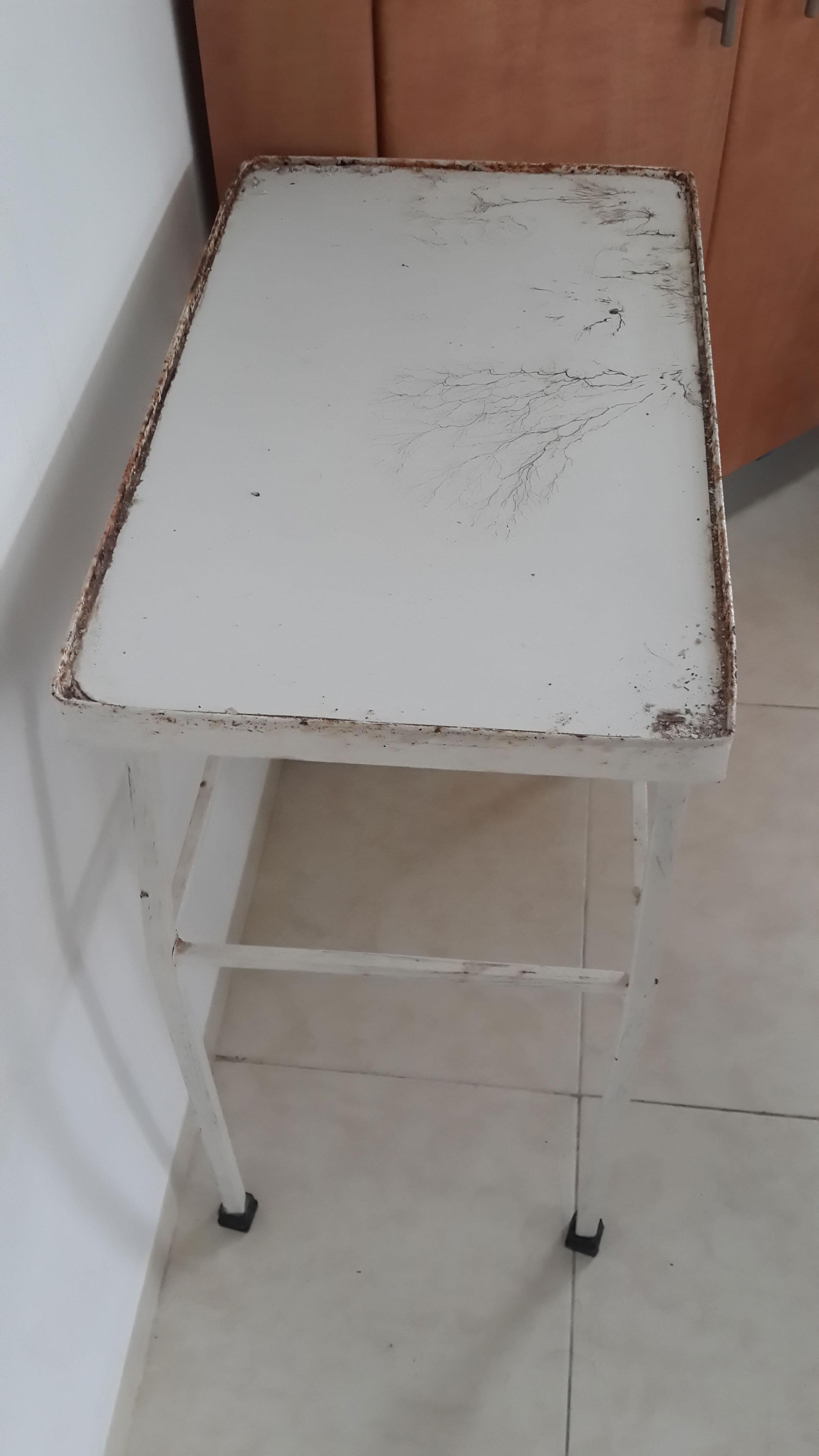 View of empty iron tea table