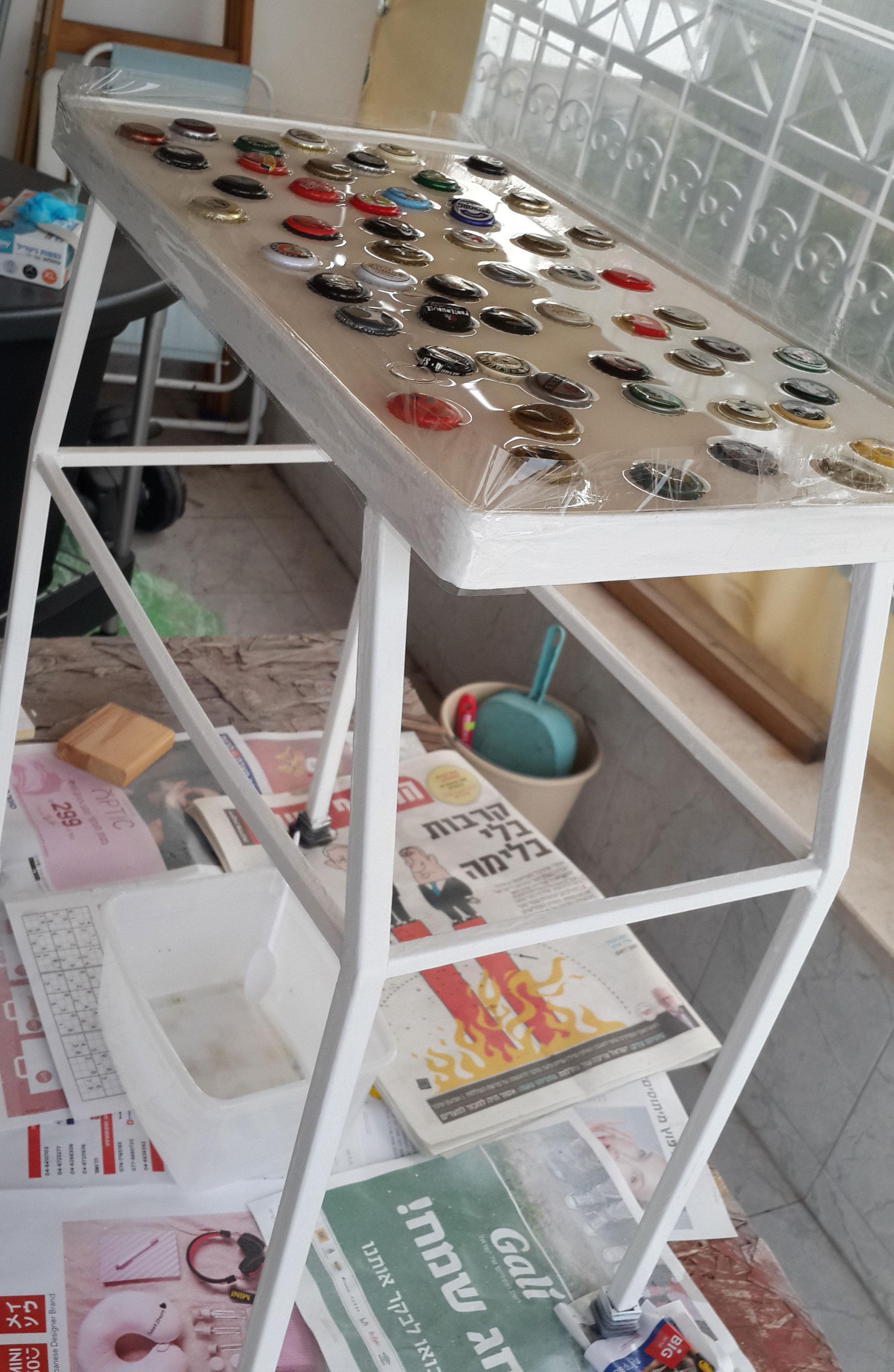 low angel view of the bottles caps showing above the resin