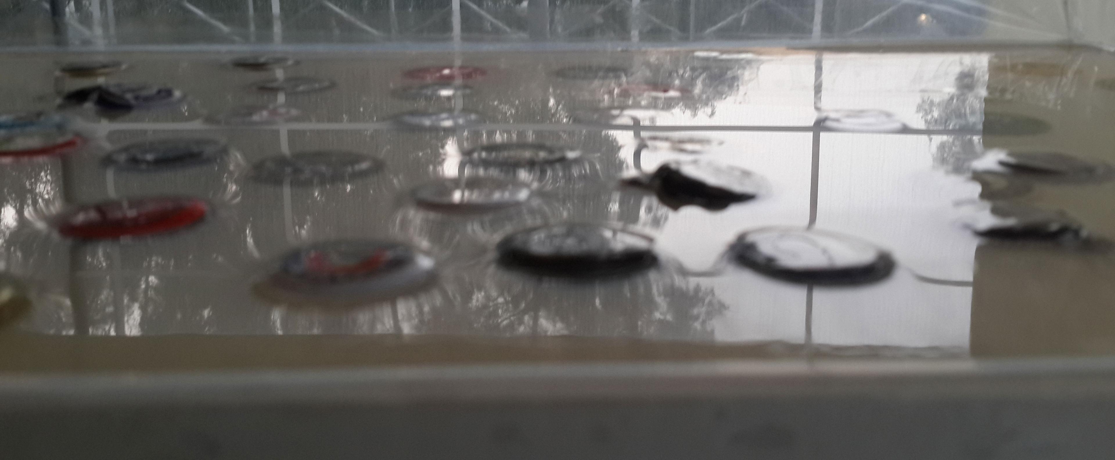 close view and low angel view of the bottles caps